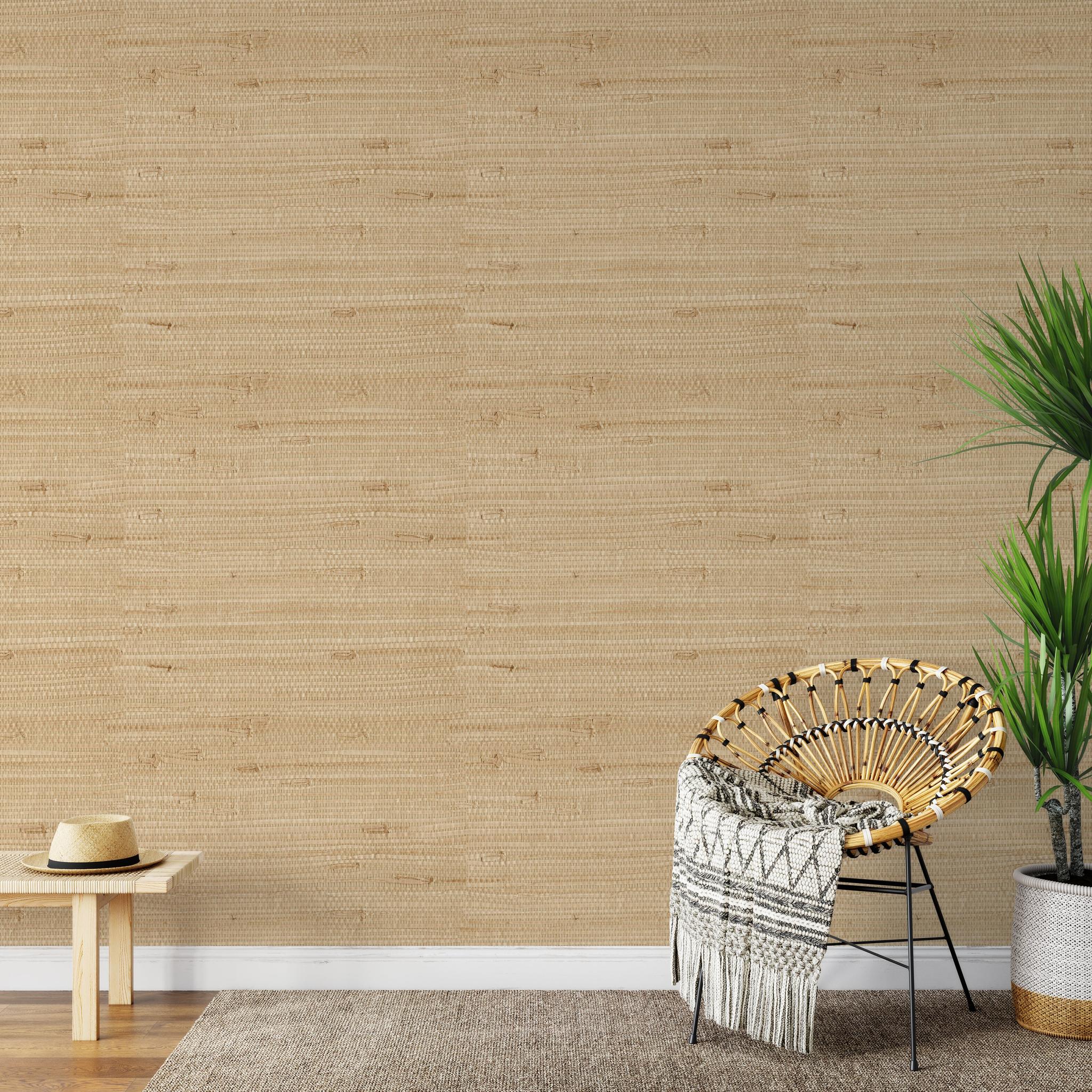 Textured grasscloth wallcovering on a finished interior wall